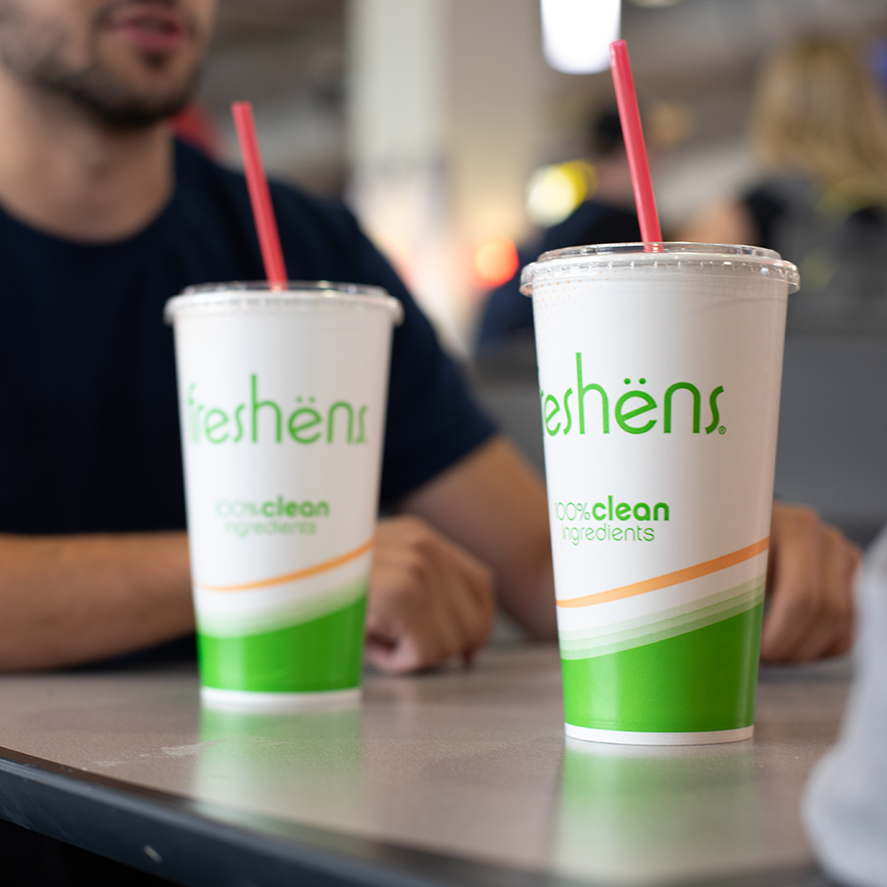 Two freshens cups on a table.